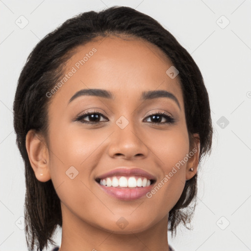 Joyful latino young-adult female with long  brown hair and brown eyes