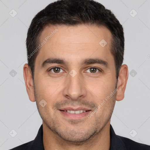 Joyful white young-adult male with short  brown hair and brown eyes