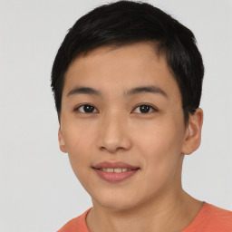 Joyful asian young-adult female with short  black hair and brown eyes