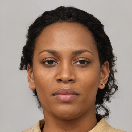 Neutral black young-adult female with short  black hair and brown eyes