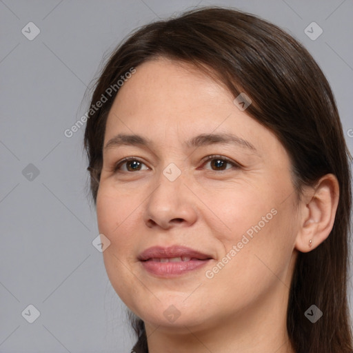 Joyful white adult female with medium  brown hair and brown eyes