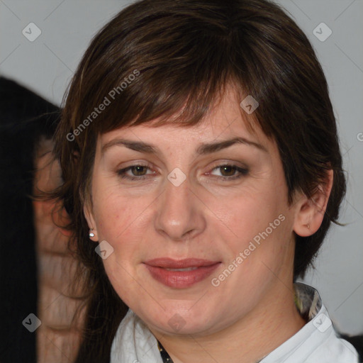 Joyful white adult female with medium  brown hair and brown eyes