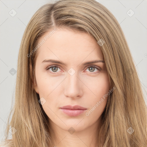 Neutral white young-adult female with long  brown hair and brown eyes