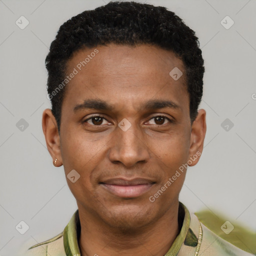 Joyful black young-adult male with short  black hair and brown eyes