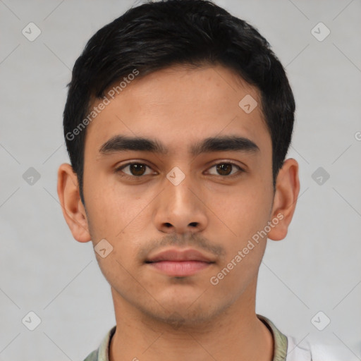 Neutral latino young-adult male with short  black hair and brown eyes