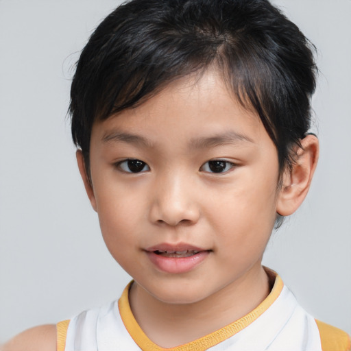 Joyful asian child female with short  brown hair and brown eyes