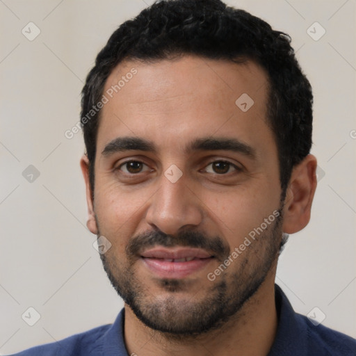 Joyful latino young-adult male with short  black hair and brown eyes