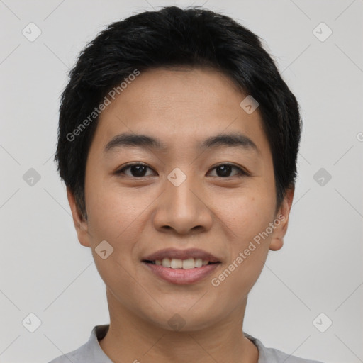 Joyful asian young-adult male with short  black hair and brown eyes