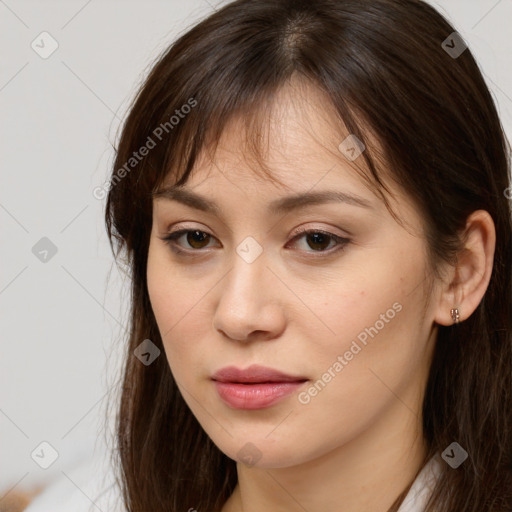 Neutral white young-adult female with long  brown hair and brown eyes