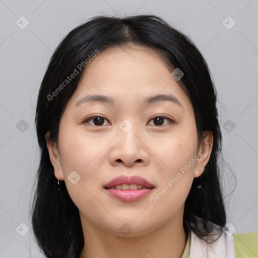 Joyful asian young-adult female with medium  black hair and brown eyes