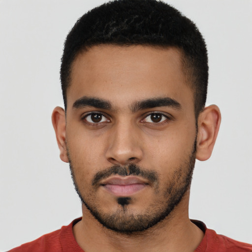 Neutral latino young-adult male with short  black hair and brown eyes