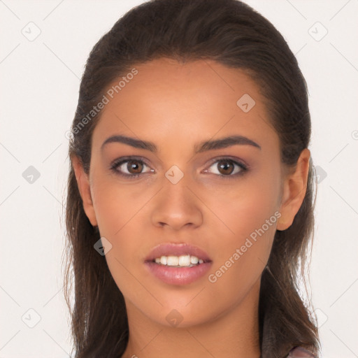 Joyful white young-adult female with long  brown hair and brown eyes