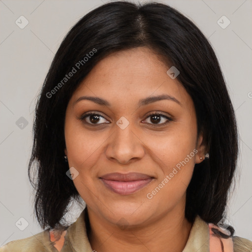Joyful black adult female with medium  brown hair and brown eyes