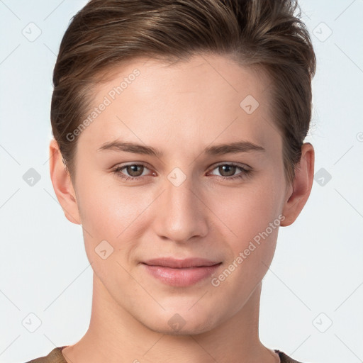 Joyful white young-adult female with short  brown hair and grey eyes