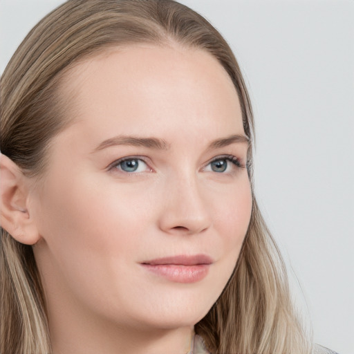 Neutral white young-adult female with long  brown hair and blue eyes