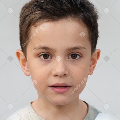 Joyful white child male with short  brown hair and brown eyes