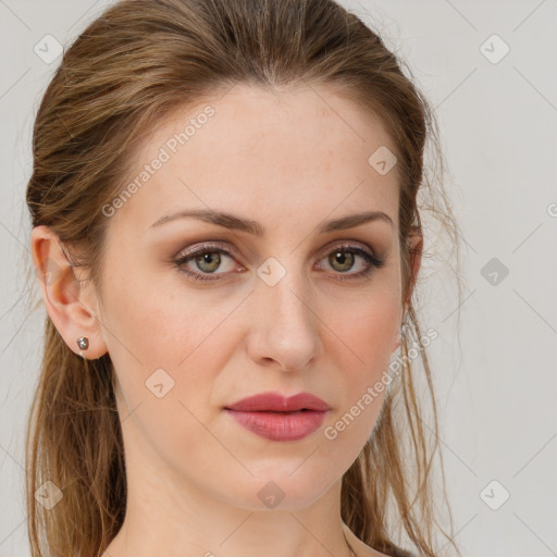 Joyful white young-adult female with long  brown hair and grey eyes