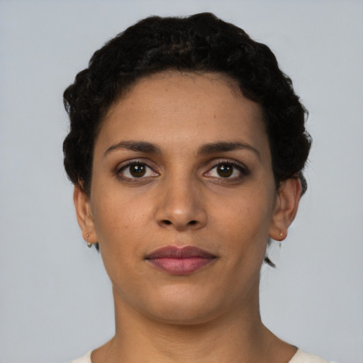 Neutral latino young-adult female with short  black hair and brown eyes