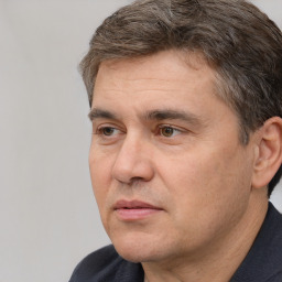 Neutral white adult male with short  brown hair and brown eyes