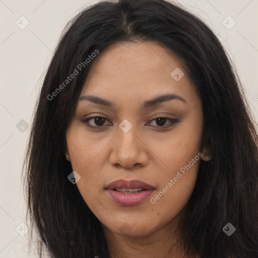 Joyful asian young-adult female with long  brown hair and brown eyes