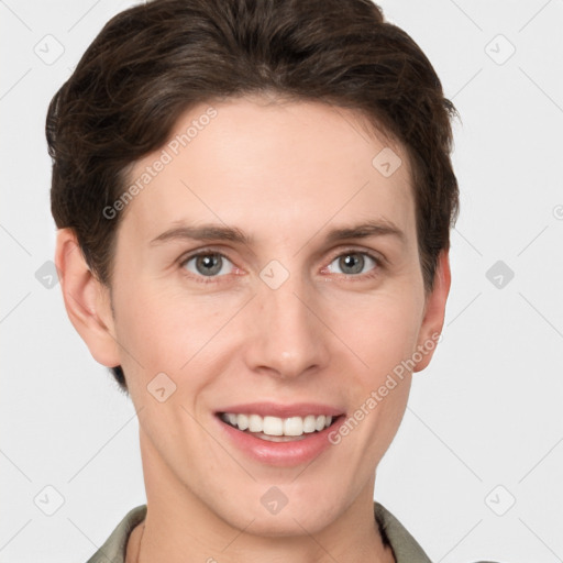 Joyful white young-adult female with short  brown hair and grey eyes