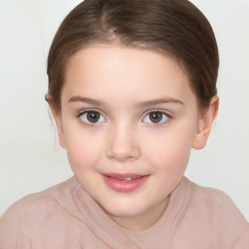 Joyful white child female with short  brown hair and brown eyes