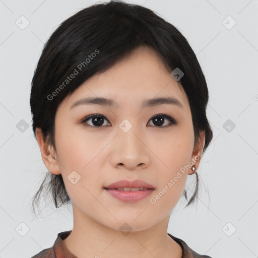 Joyful asian young-adult female with medium  black hair and brown eyes