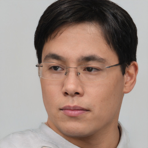 Neutral asian young-adult male with short  brown hair and brown eyes