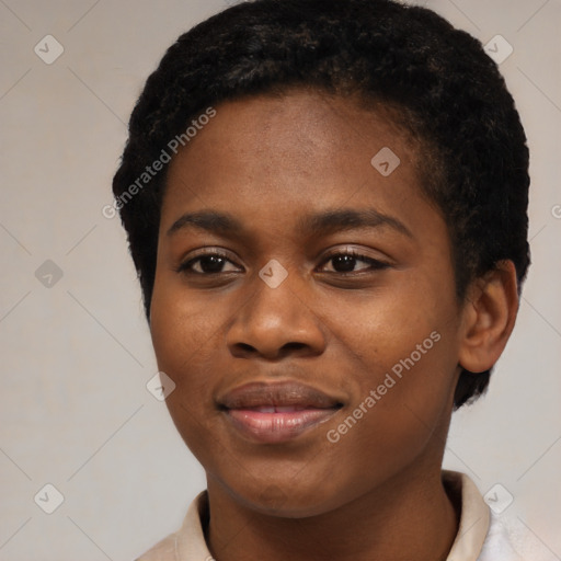 Joyful black young-adult female with short  black hair and brown eyes