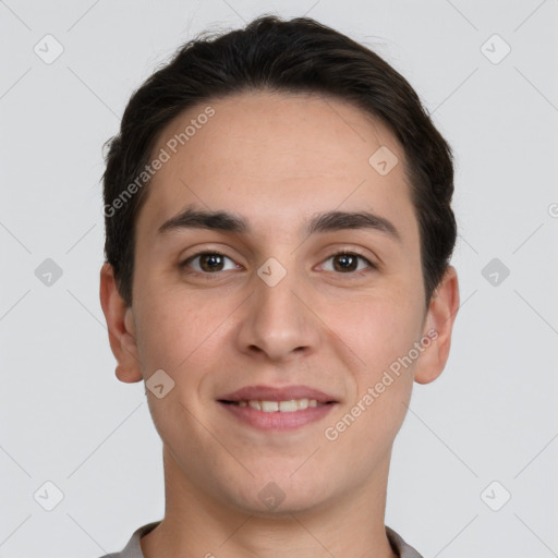 Joyful white young-adult male with short  brown hair and brown eyes