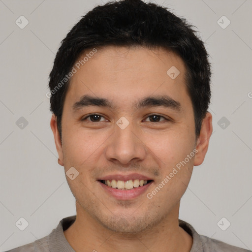 Joyful latino young-adult male with short  black hair and brown eyes