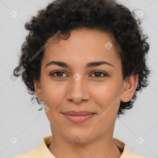 Joyful latino young-adult female with short  brown hair and brown eyes