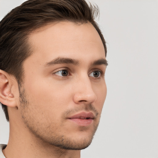 Neutral white young-adult male with short  brown hair and brown eyes