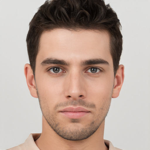 Neutral white young-adult male with short  brown hair and brown eyes