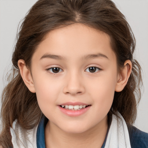 Joyful white child female with medium  brown hair and brown eyes