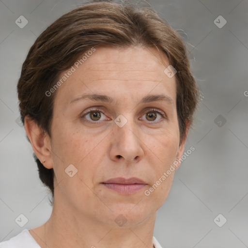 Joyful white adult female with short  brown hair and brown eyes