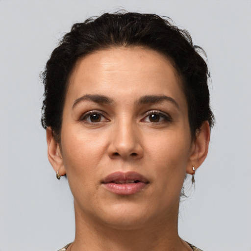 Neutral white young-adult female with short  brown hair and brown eyes