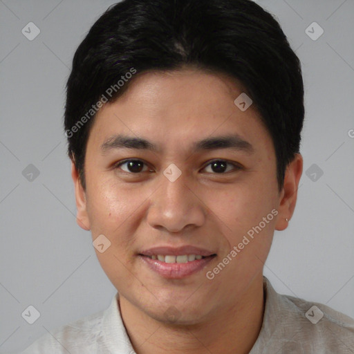 Joyful asian young-adult male with short  brown hair and brown eyes