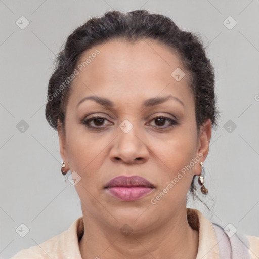 Joyful latino adult female with short  brown hair and brown eyes