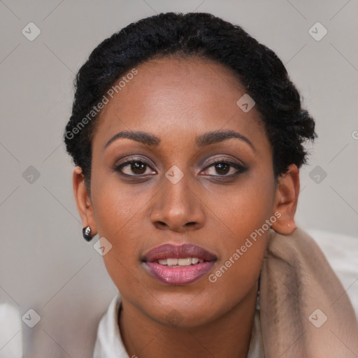 Joyful black young-adult female with short  brown hair and brown eyes