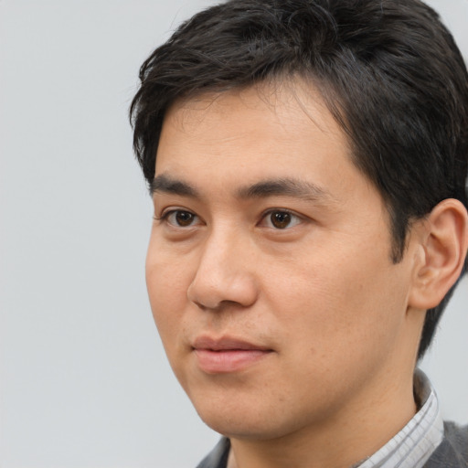 Neutral asian young-adult male with short  black hair and brown eyes