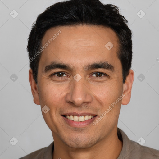 Joyful white young-adult male with short  black hair and brown eyes