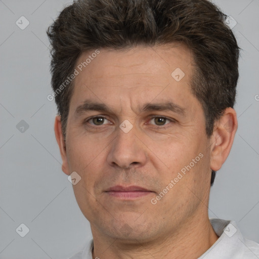 Neutral white adult male with short  brown hair and brown eyes