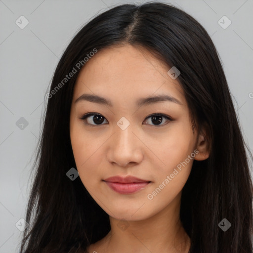 Joyful asian young-adult female with long  black hair and brown eyes