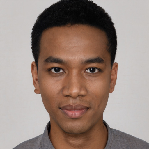Neutral black young-adult male with short  black hair and brown eyes