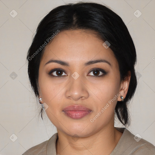 Joyful latino young-adult female with medium  black hair and brown eyes