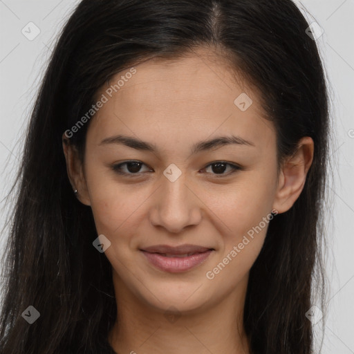 Joyful latino young-adult female with long  brown hair and brown eyes