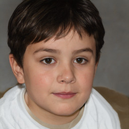 Joyful white child male with short  brown hair and brown eyes