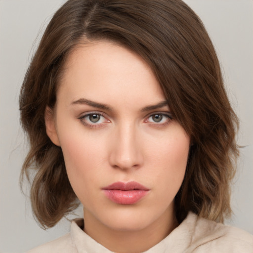 Neutral white young-adult female with medium  brown hair and brown eyes