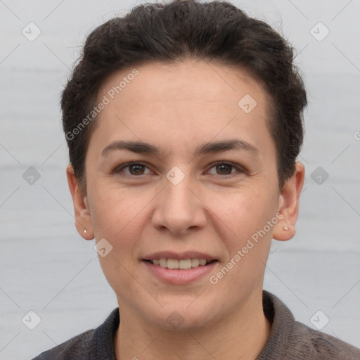 Joyful white adult female with short  brown hair and brown eyes